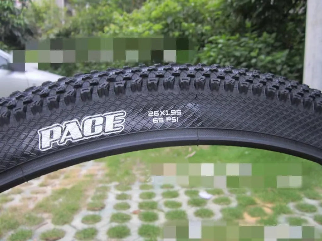 Mountain bike ultralight puncture-proof tyre showing tread pattern and white-label sidewall variant.