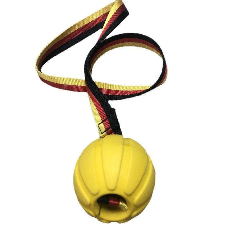 Yellow and camouflage coloured EVA floating knot balls for dogs in three different sizes on a blue background.
