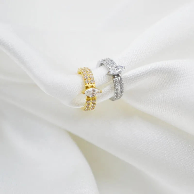 Gold and silver titanium steel heart-shaped earrings with zircon stones measuring 1.2x8mm