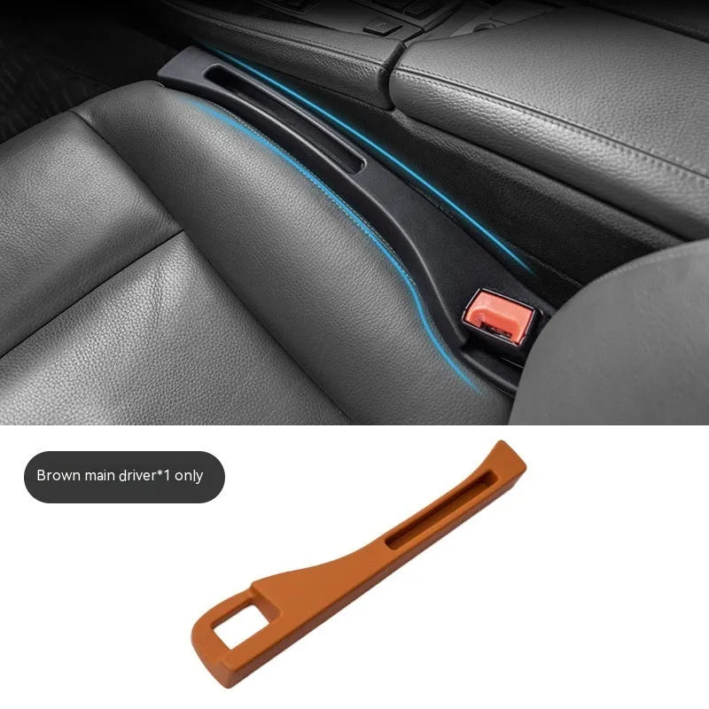 Black plastic car seat gap storage box organiser with handle between vehicle seats
