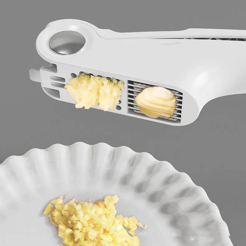 Manual garlic press kitchen gadget with ABS and stainless steel construction in white green orange colours