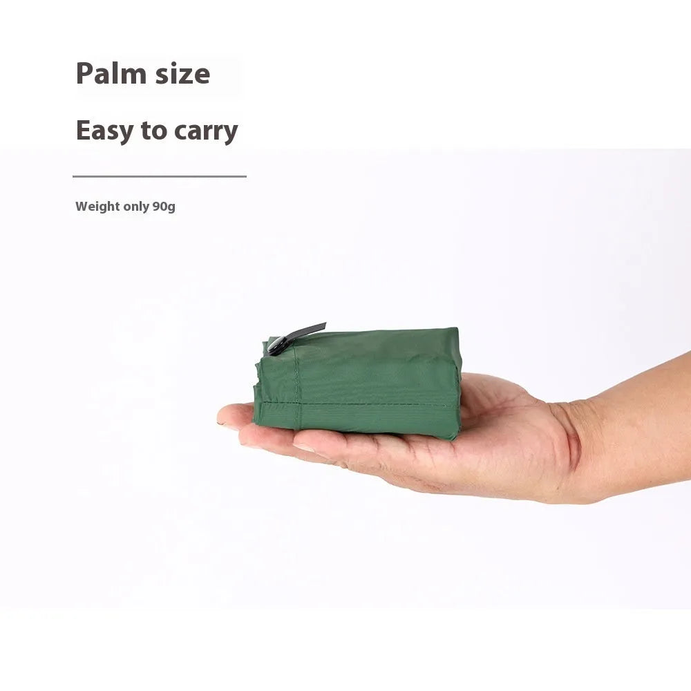 Inflatable camping cushion in grey, 40D nylon TPU, measures 5x34x44cm, lightweight and waterproof for outdoor use