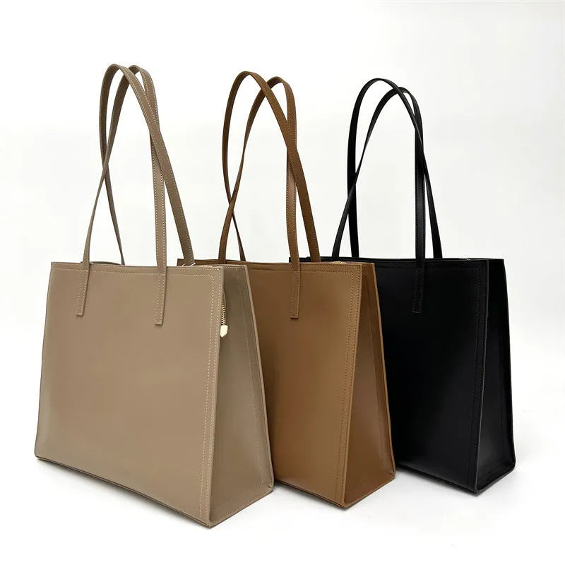 Brown genuine leather women's one shoulder handbag with a horizontal square shape.