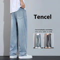 Men's straight leg trousers in ice silk denim with wide leg silhouette showing zip fly detail
