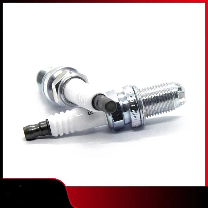 Silver automotive spark plug with 3 kiloohm resistance for BMW, Mini, and Rolls Royce automatic transmission vehicles