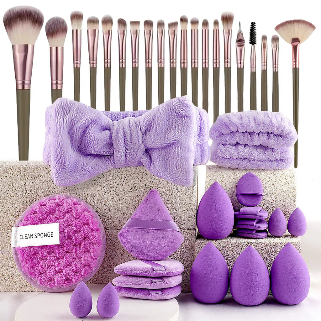 Beauty tool combination set with multiple pieces in brown, pink and purple colours for makeup and skincare