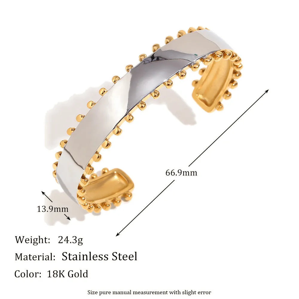 Women's stainless steel jewellery set with gold electroplated finish showing earrings, necklace and bracelet