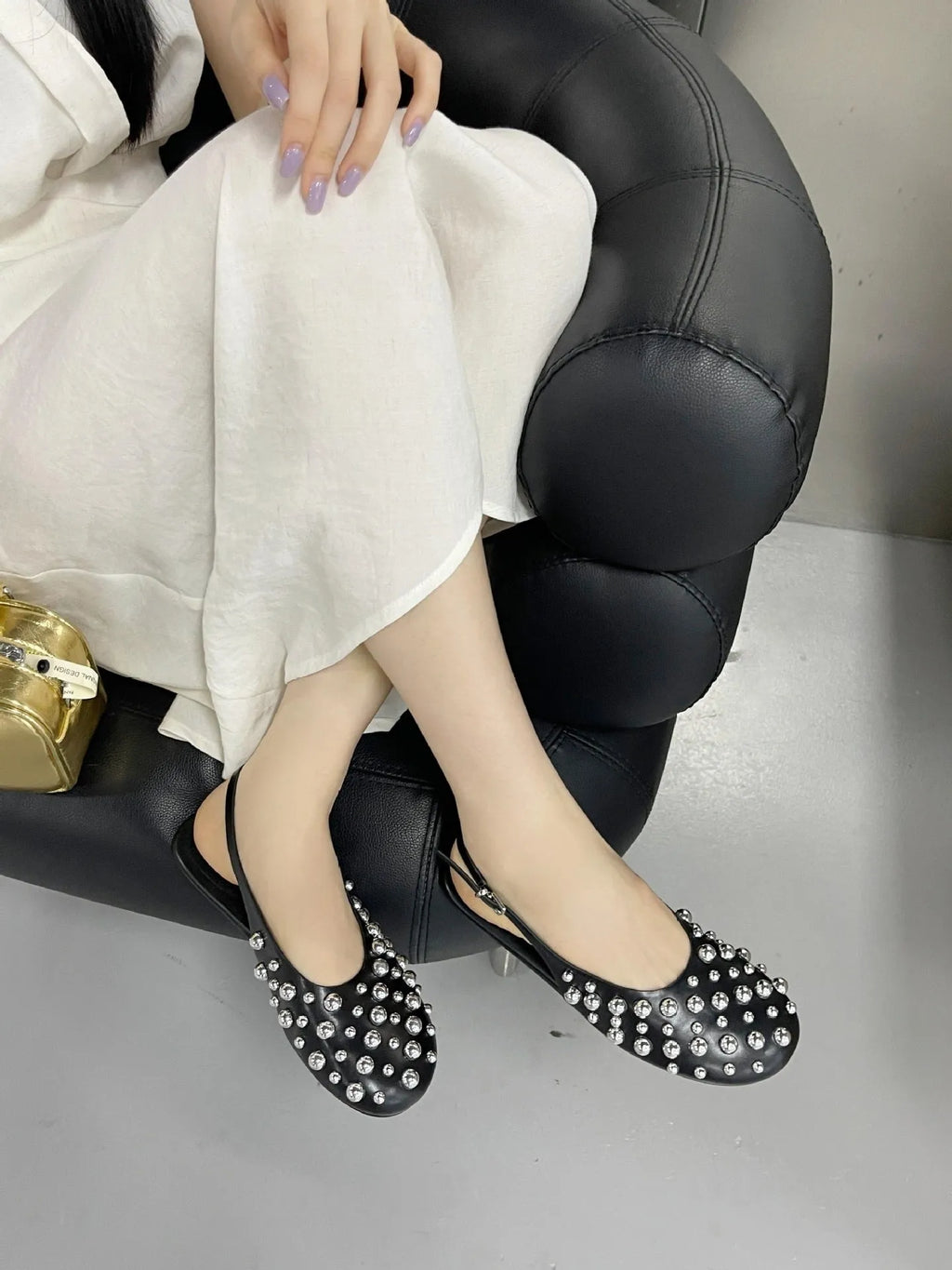 Women's flat sandals with rivet button detail, cowhide upper, black gold and black silver, sizes 35-43.