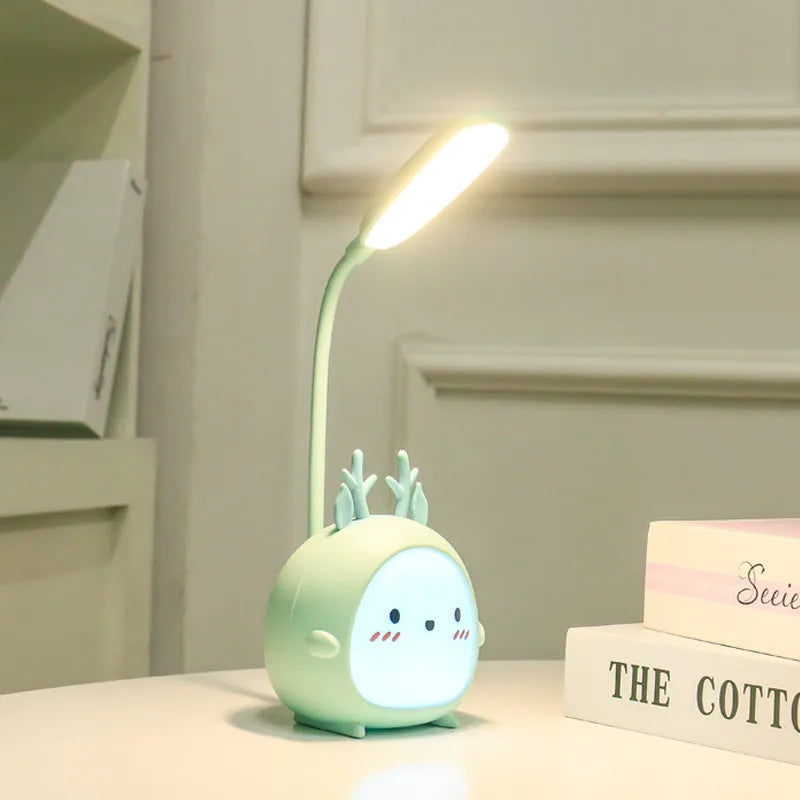 Cartoon deer USB charging folding LED reading lamp with plastic shade on desk