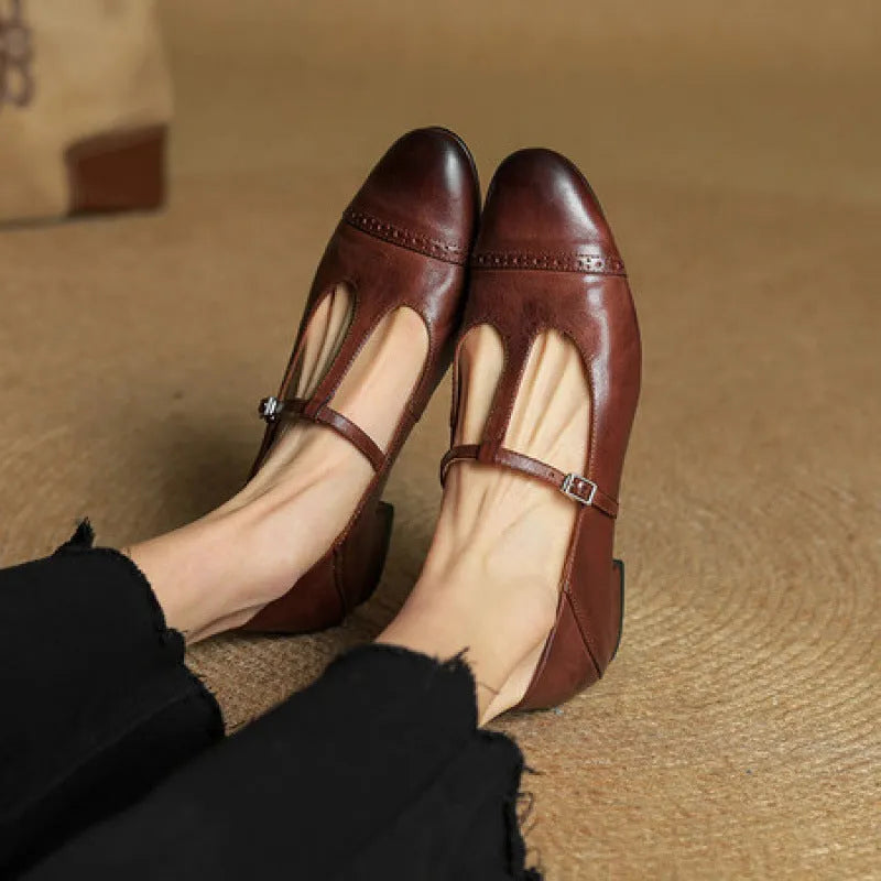 Women's T-shaped buckle cowhide round toe flats in brown with wedge heel and pigskin leather lining