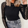 Black leopard print mesh stitching knitted long-sleeved top for women, front view