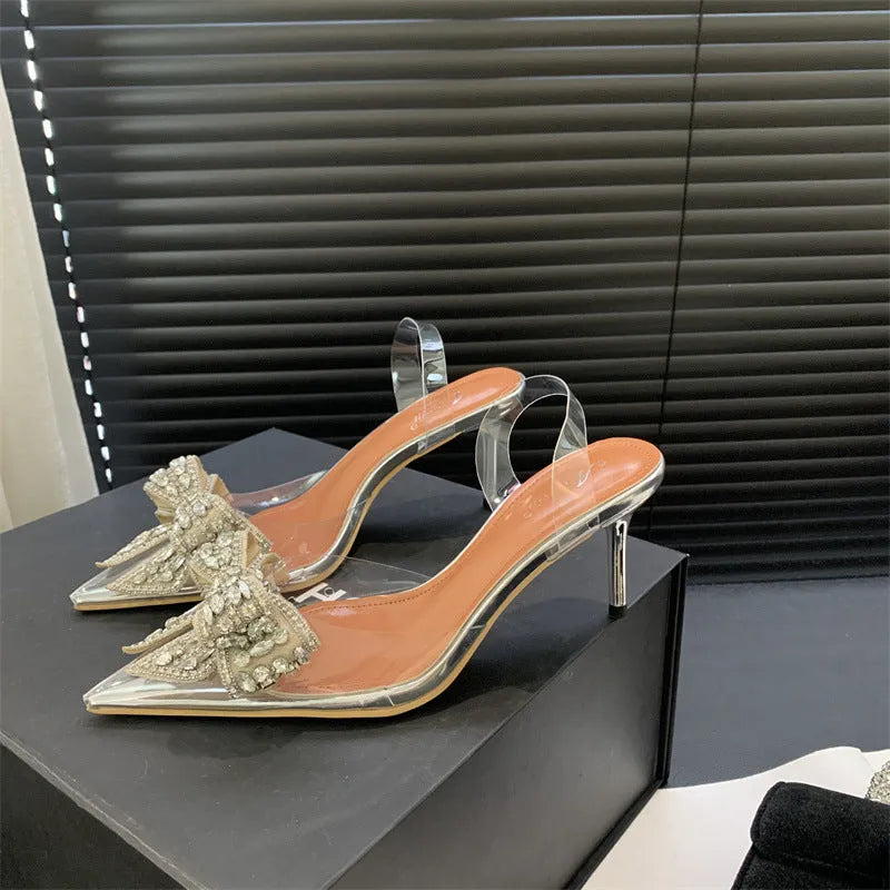 Silver pointed toe bow rhinestone transparent high heel sandals with slip-on design