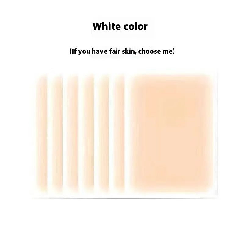 Pack of adhesive tattoo cover patches in various flesh tones on skin, showing 130mm length.