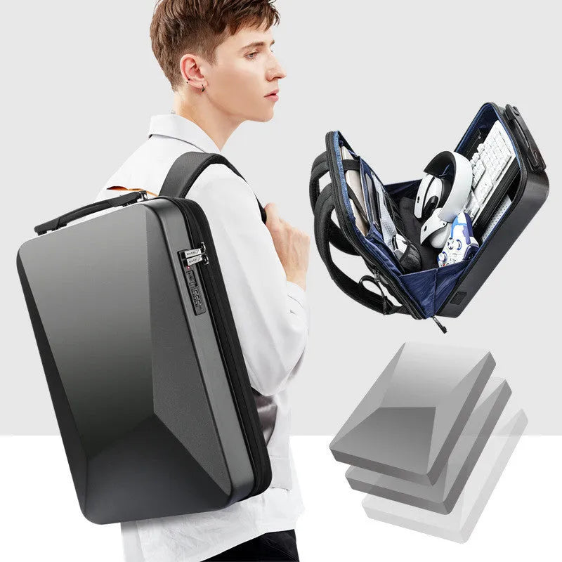 PC hard shell gaming backpack in black or silver with multiple compartments and shoulder straps