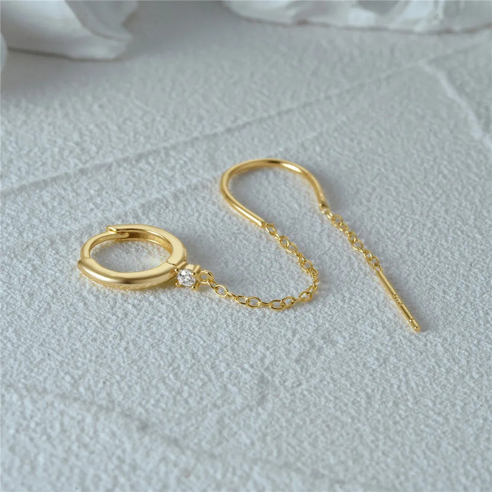 S925 sterling silver ear clip stud earrings with geometric flower design and golden electroplated tassel chain.