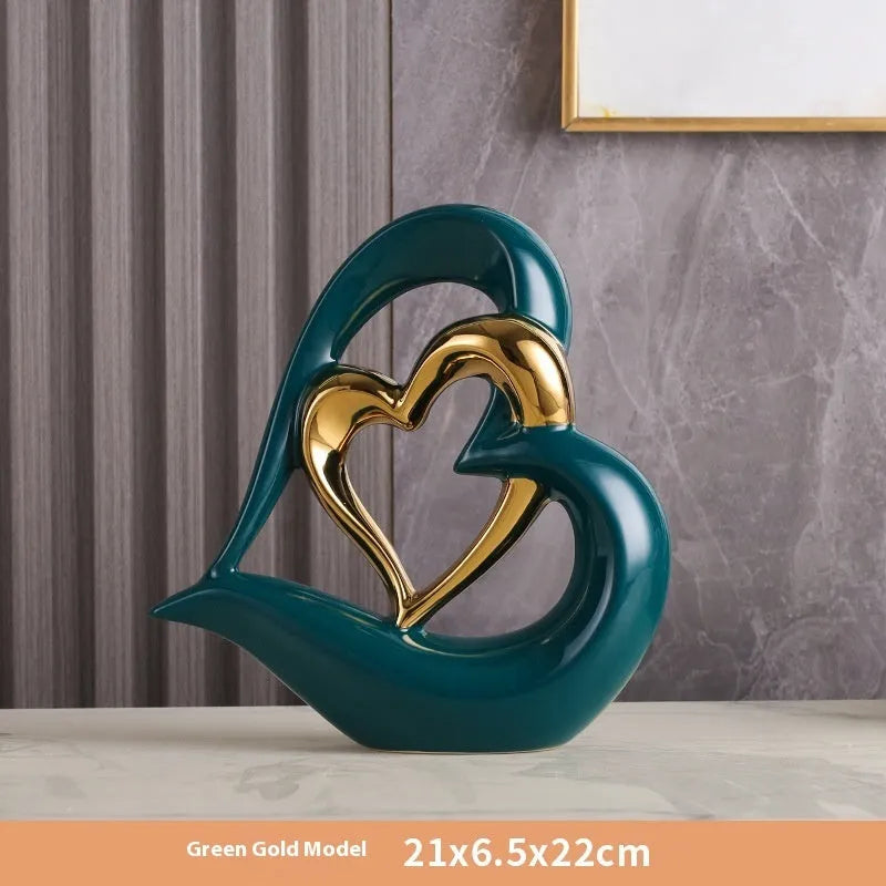 Modern white porcelain heart ornament with metallic finish in geometric design for living room or wine cabinet decoration