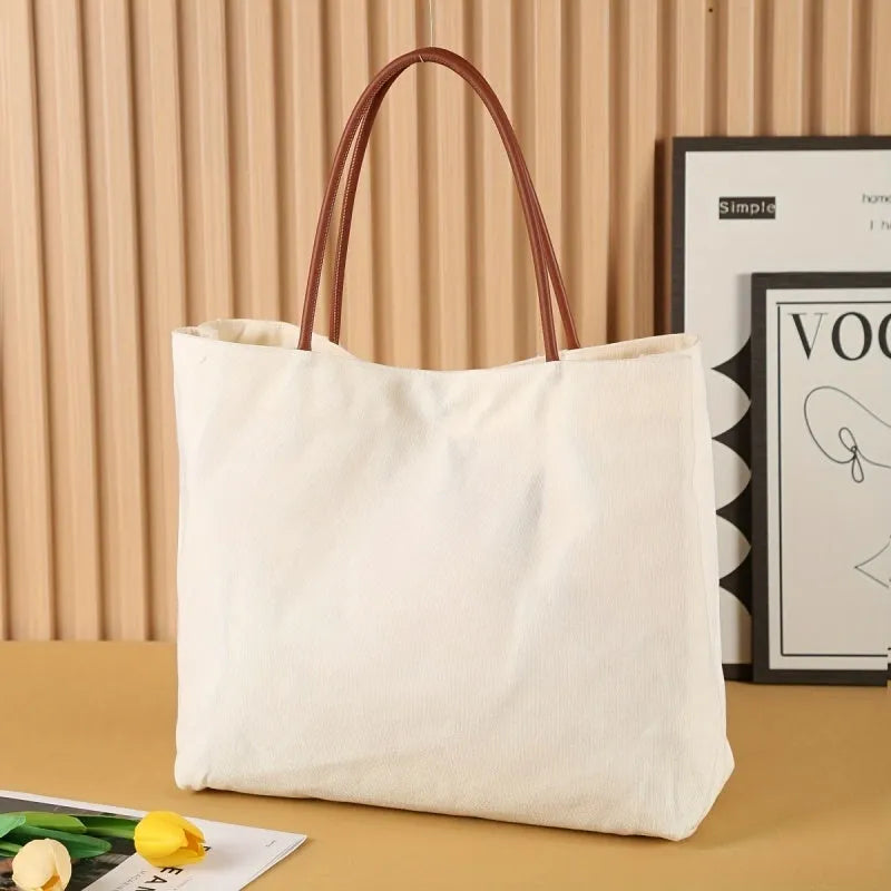 Canvas tote bag with side gussets in beige white colour, shown with handles extended