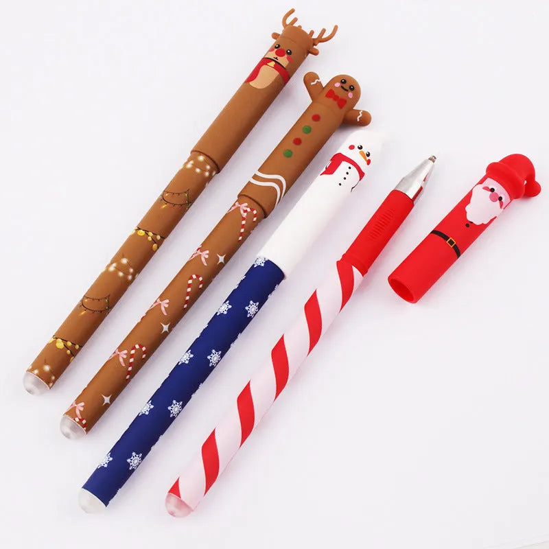 Four Christmas-themed erasable gel pens with Santa, gingerbread man, elk, and snowman designs on a white background