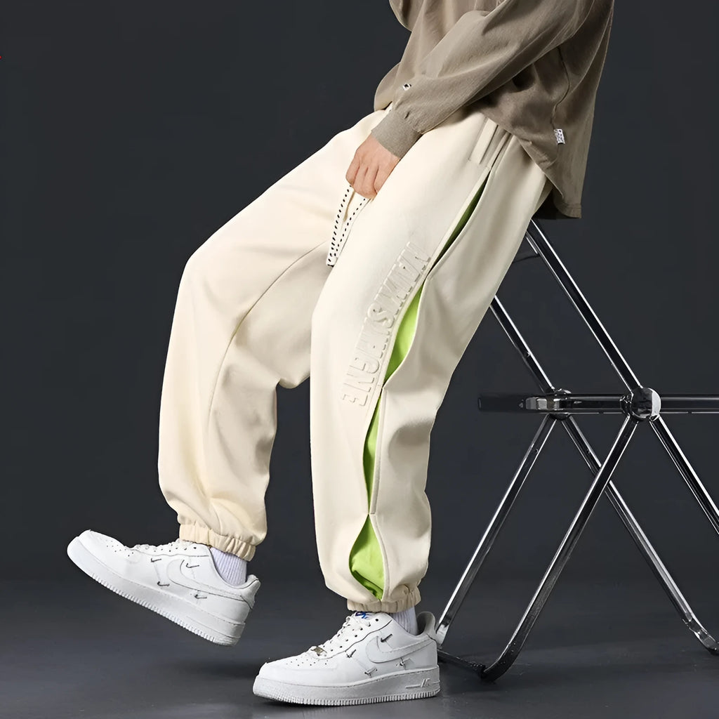 Men's cotton banded ankle pants with collage stitching detail in loose fit design