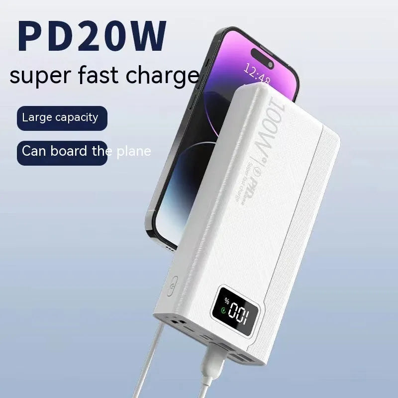 Large capacity power bank in black or white with plastic shell showing charging ports
