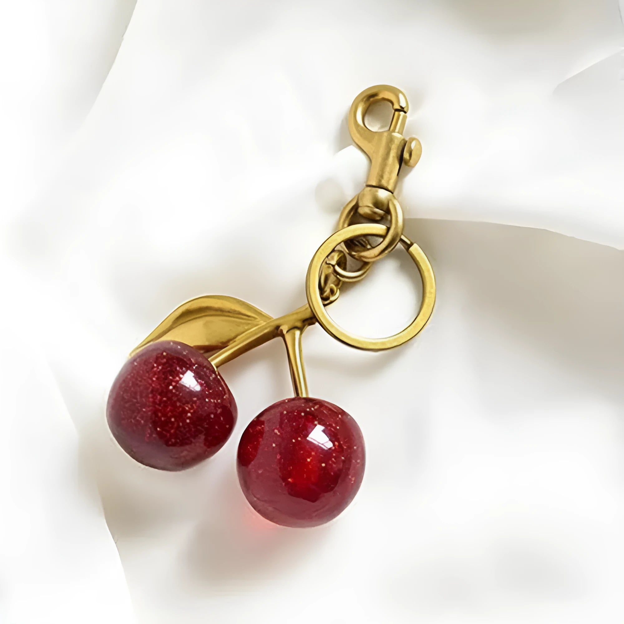 Red zinc alloy cherry key ring pendant with three-dimensional design