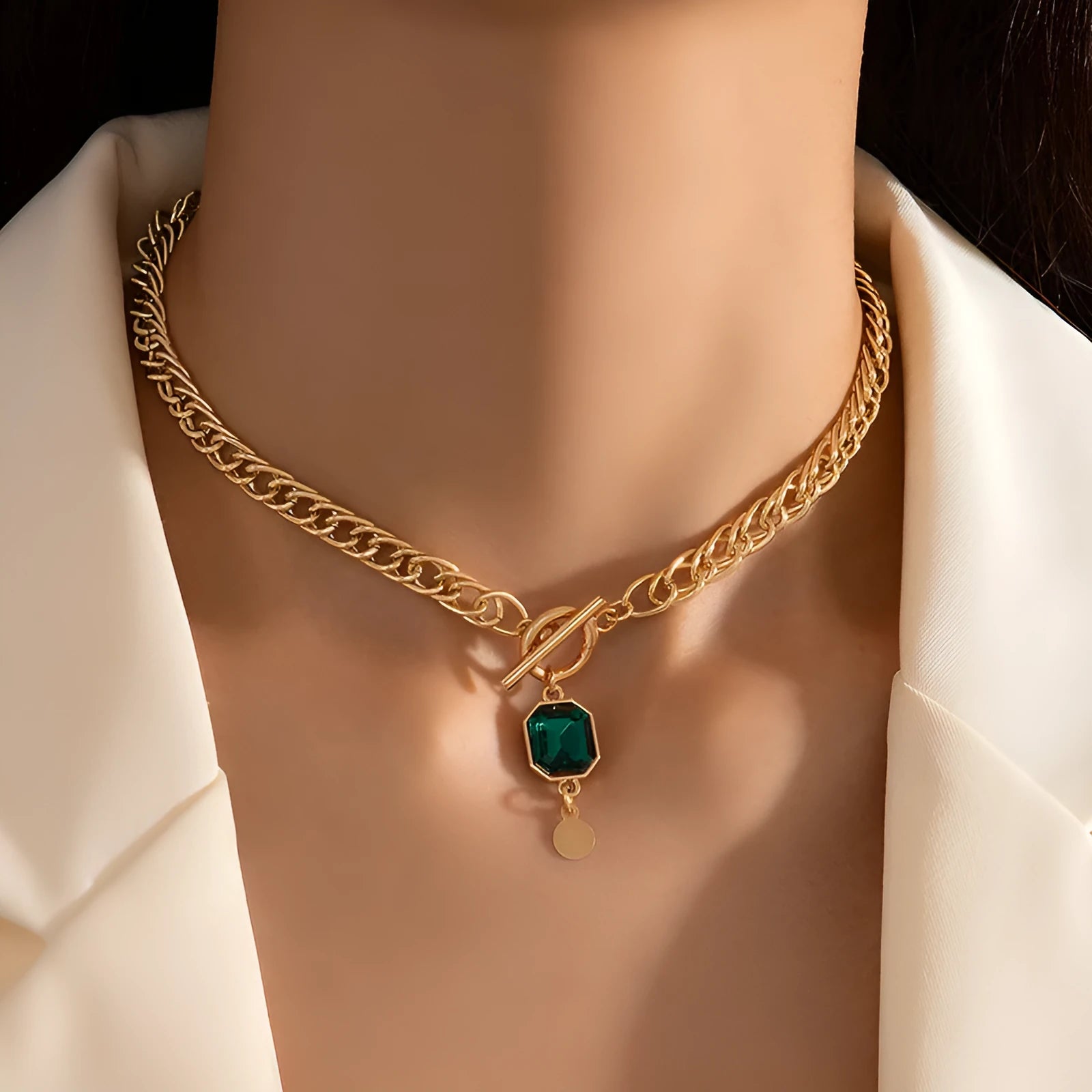 Gold geometric round pendant necklace on Cuban link chain with French retro styling