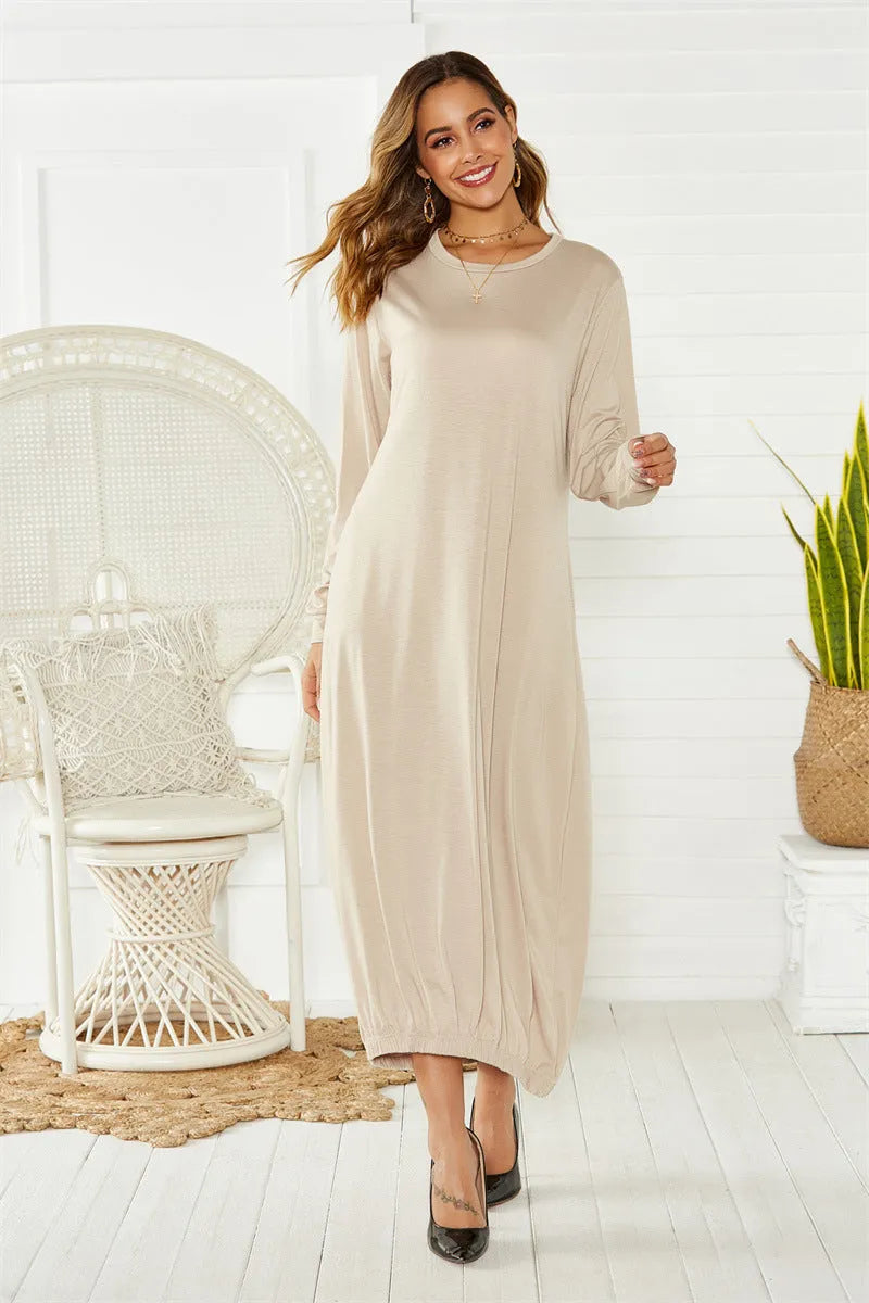 Black loose lace-up crew neck lantern dress on a hanger, casual polyester knit.