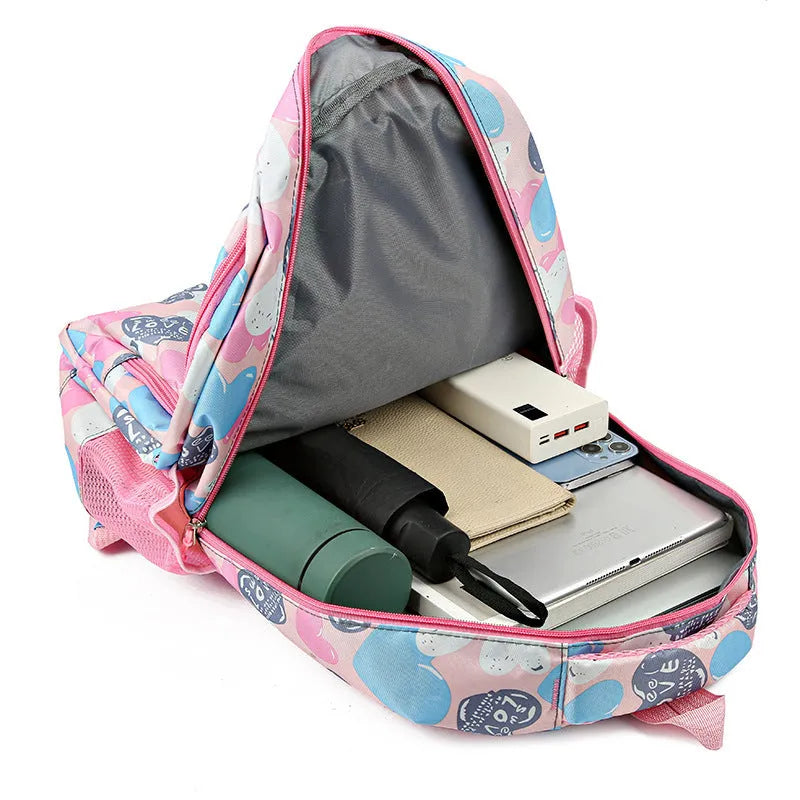 Blue children's school backpack with air pillow belt system for burden alleviation