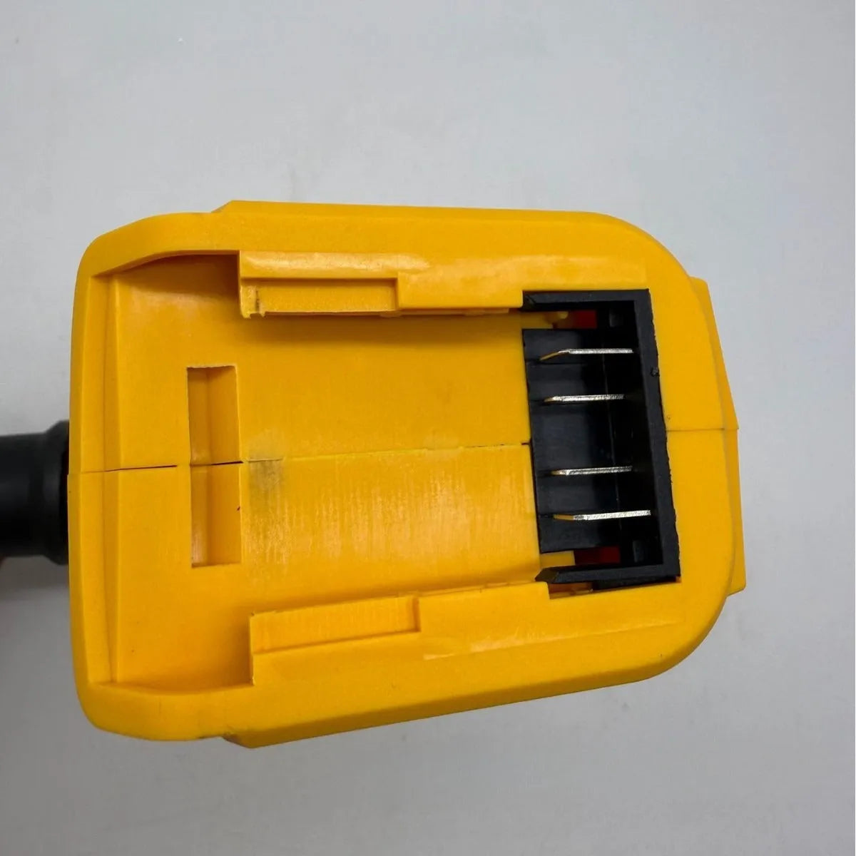 Cordless lithium battery air exhauster dust blower with bare metal head for snow removal.