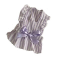 Purple dog dress with thin vest, bowknot, and striped skirt on light background