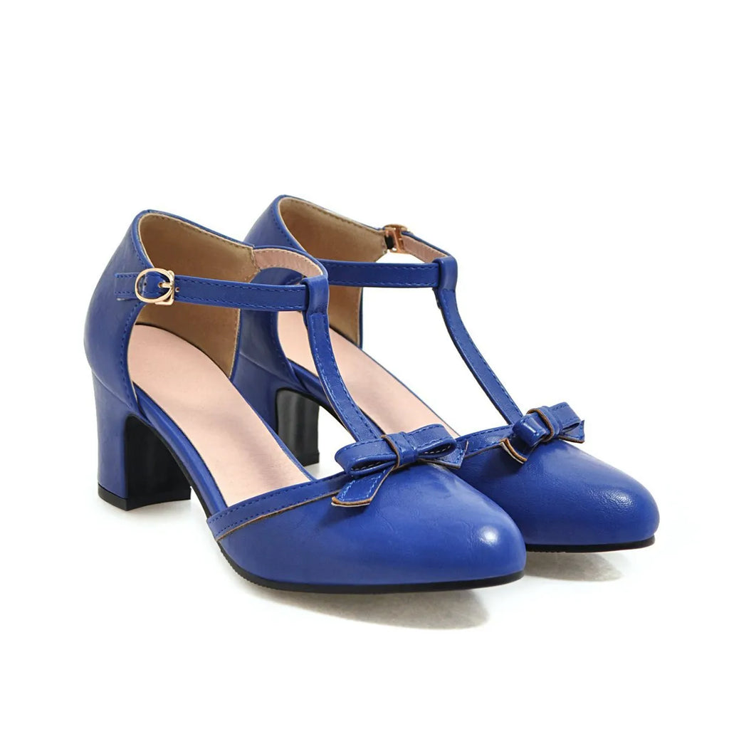 Women's apricot chunky heel sandals with hollow-out round toe, bow detail, and a buckle strap on a 6.5cm heel.