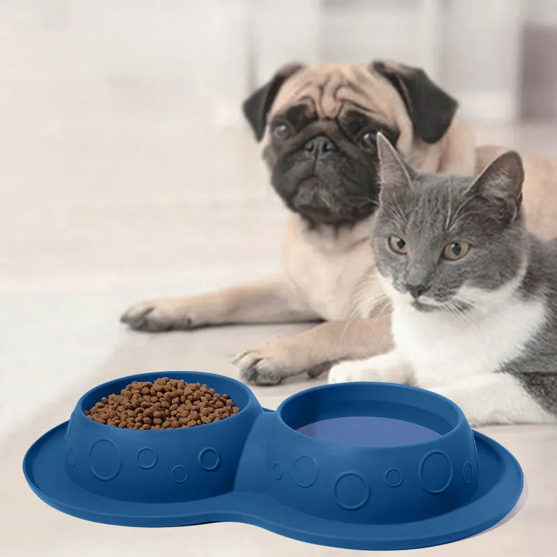 Blue silicone non-slip waterproof pet feeding mat with raised edge and bowl area, 45x30cm