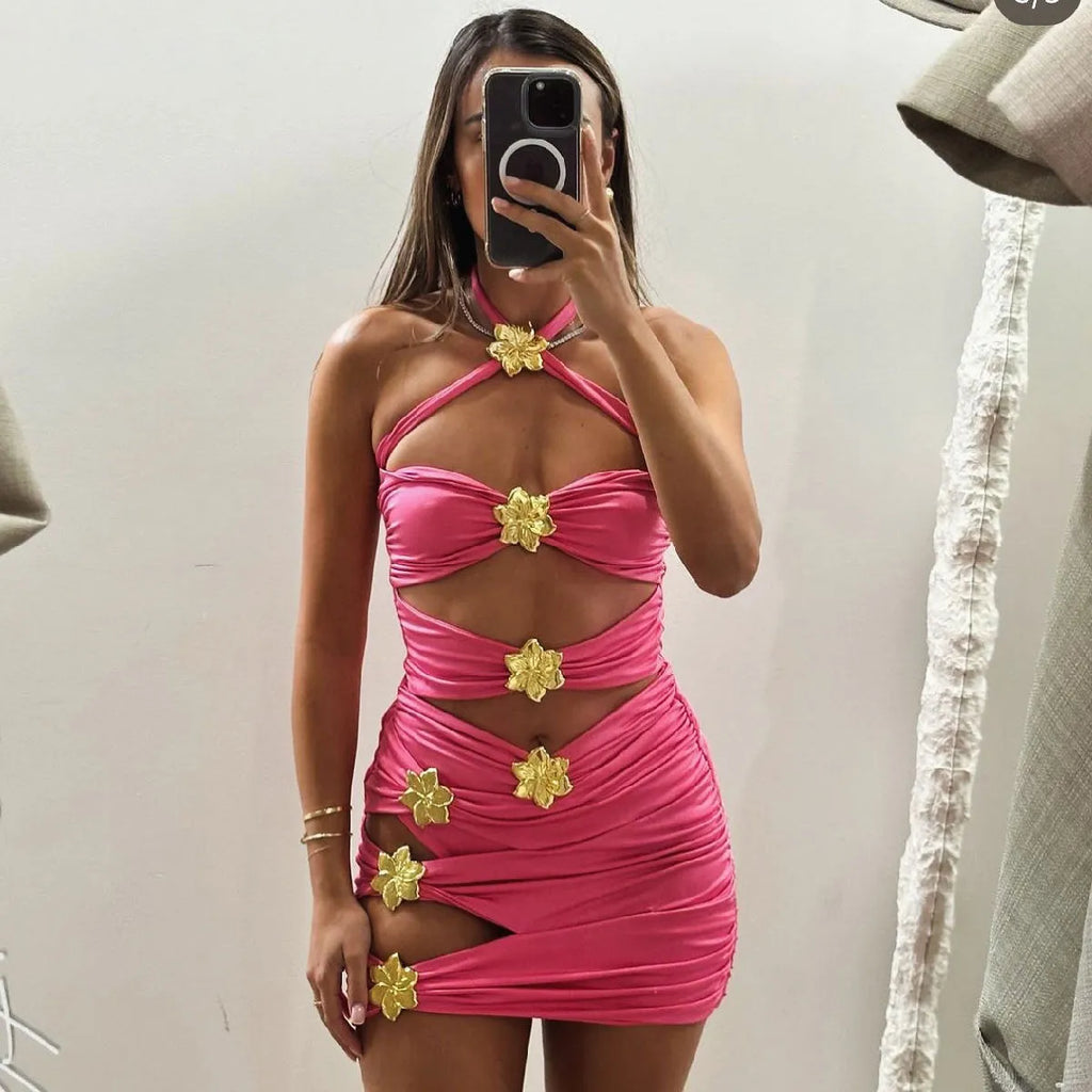 Women's solid colour one-piece swimsuit with high waist and hollow-out tube top, paired with a matching short skirt.
