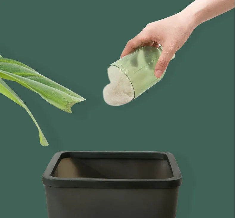 Electric cat and dog hair suction cleaner in green, USB powered, 244x72x157mm, with two suction heads on a fabric surface.