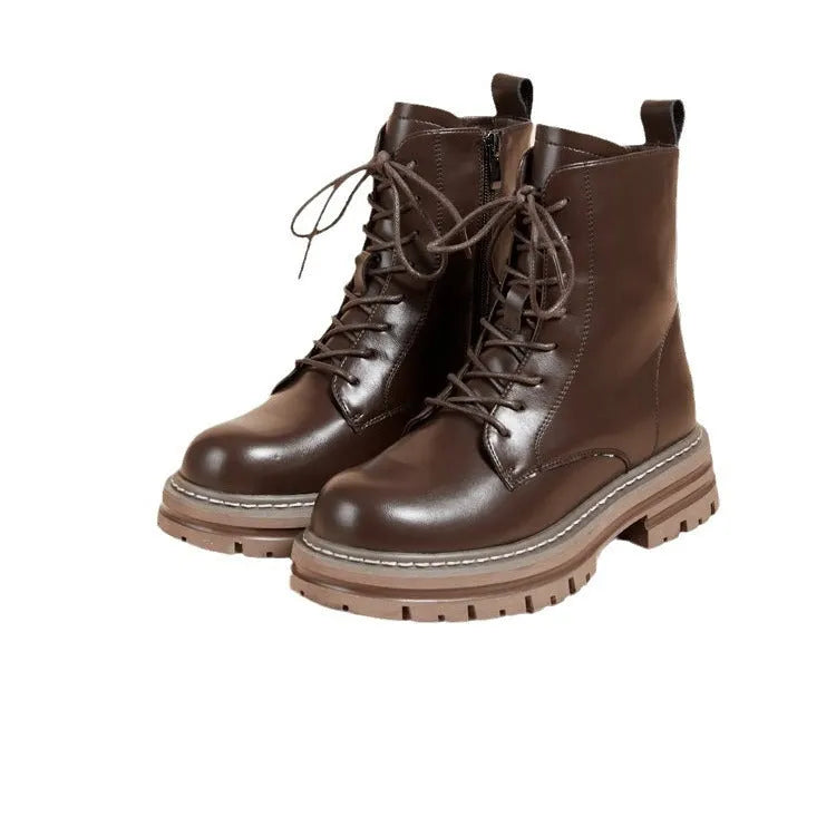 Retro British style platform ankle boots with front lace-up, horseshoe heel, and visible stitching in black
