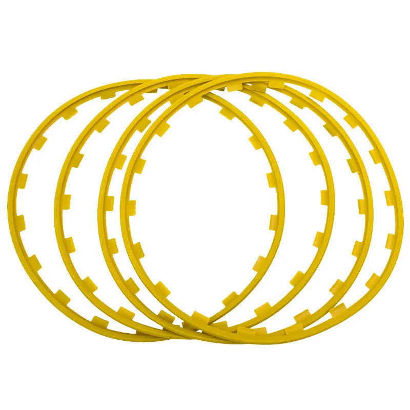 Set of four coloured nylon wheel hub guard rings in sizes 16 to 20 inches.