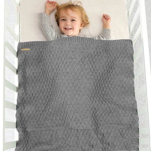 Solid colour infant hug blanket with three-dimensional lines texture showing 70×90cm dimensions