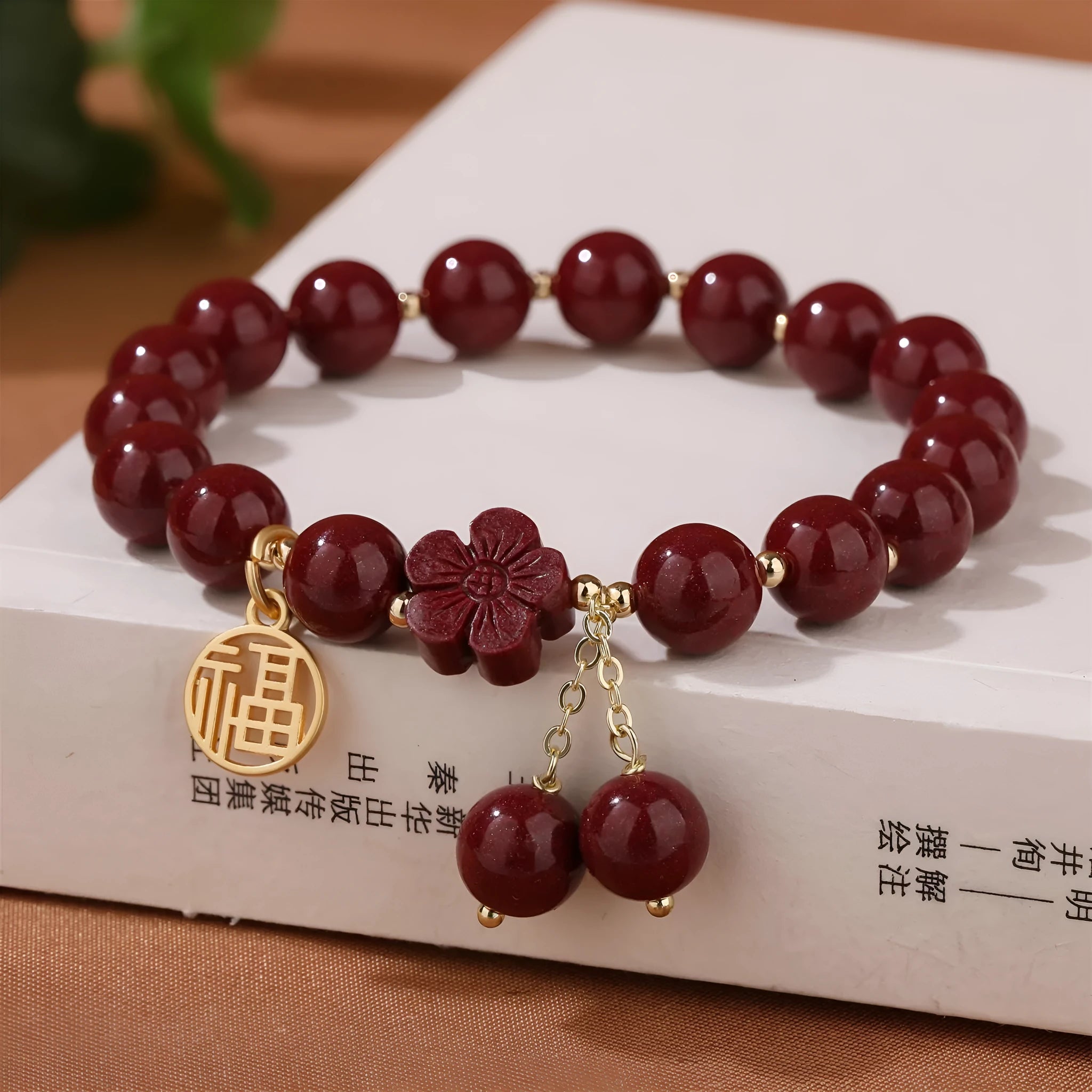 Women's cinnabar bracelet with fu character design and adjustable tassel closure in national style