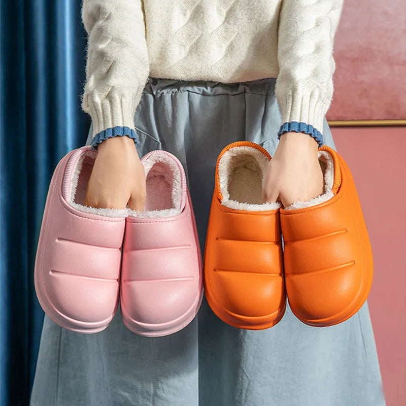 A pair of waterproof EVA couple slippers in various colours, showing plush lining and a non-slip sole.